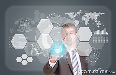 Businessman in suit finger presses virtual button Stock Photo