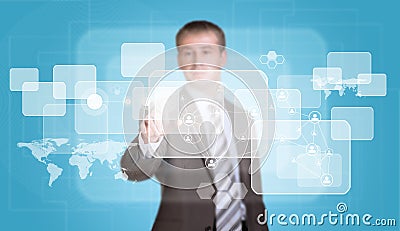 Businessman in suit finger presses virtual button Stock Photo