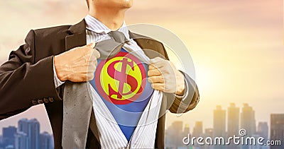 Businessman in superhero costume with dollar sign Stock Photo