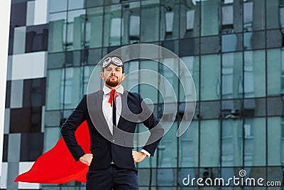 Businessman in a superman costume. Stock Photo