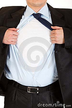 Businessman superman tearing his shirt. Close-up. Stock Photo