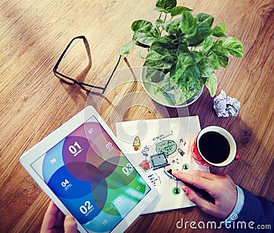 Businessman with Tablet and Sketched Napkin Stock Photo