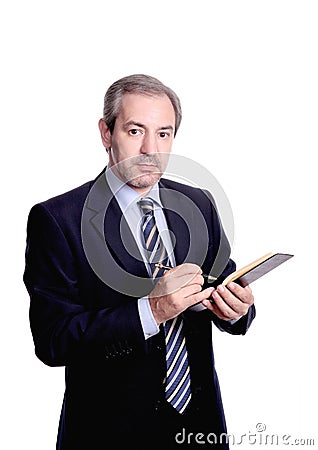 Businessman taking notes Stock Photo