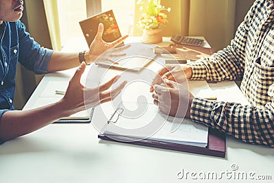 Businessman during talk with co-workers Stock Photo