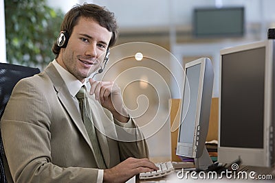 Businessman talking on a headset Stock Photo