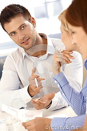 Businessman talking at meeting Stock Photo