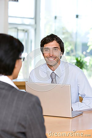 Businessman talking to client Stock Photo