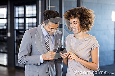 Businessman talking to young woman Stock Photo