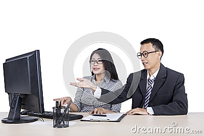 Businessman telling his employee some tasks to do Stock Photo