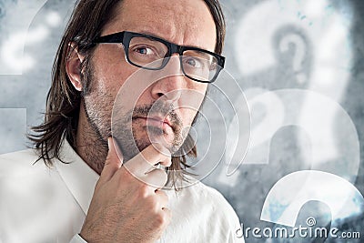 Businessman thinking and questioning Stock Photo