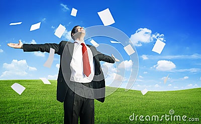 Businessman Throwing Documents Stock Photo