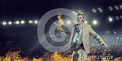 Businessman throwing petrol bomb . Mixed media Stock Photo