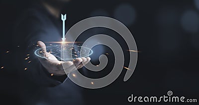 Businessman throwing red arrow dart to virtual target dart board. Setup objectives and target for business investment concept Stock Photo