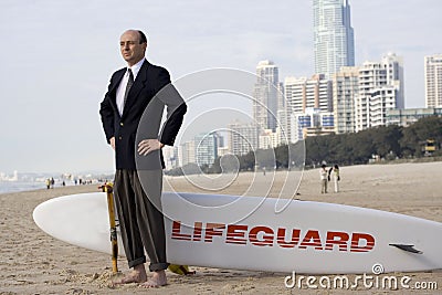 Businessman to the rescue Stock Photo