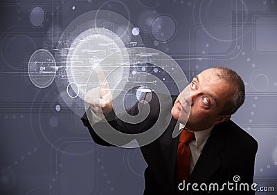 Businessman touching abstract high technology circular buttons Stock Photo