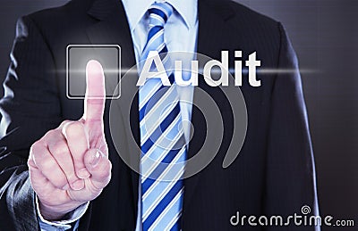 Businessman touching audit button Stock Photo