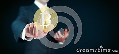 Businessman touching Bitcoin in screen Stock Photo