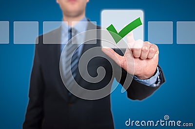 Businessman Touching Button and Ticking Check Box Stock Photo