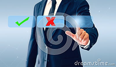 Businessman touching check marks virtual button. Concept of business decision may be right or wrong Stock Photo