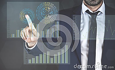 Businessman touching finance graph with finger Stock Photo