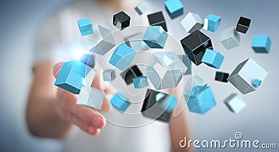 Businessman touching floating blue shiny cube network 3D rendering Stock Photo