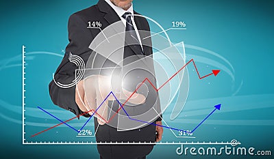 Businessman touching futuristic pie chart interface Stock Photo