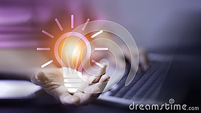 Businessman Touching Icon Bulb.Concept of Ideas for success.Concept with innovation inspiration.Success start from new ideas to Stock Photo