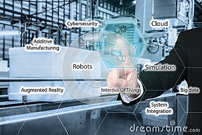 Businessman touching industry 4.0 icon in virtual interface Stock Photo