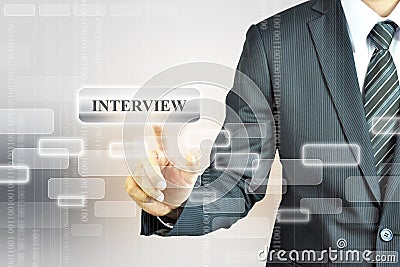 Businessman touching INTERVIEW sign Stock Photo