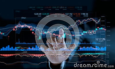 Businessman touching stock market graph on virtual screen Stock Photo