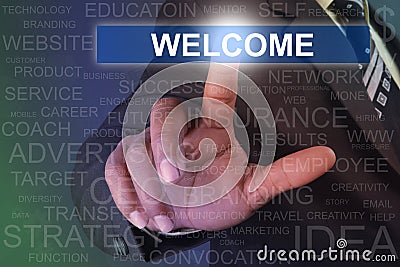 Businessman touching welcome button on virtual screen Stock Photo