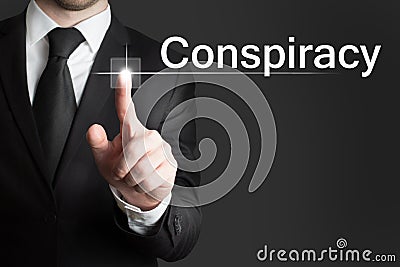 Businessman touchscreen conspiracy Stock Photo