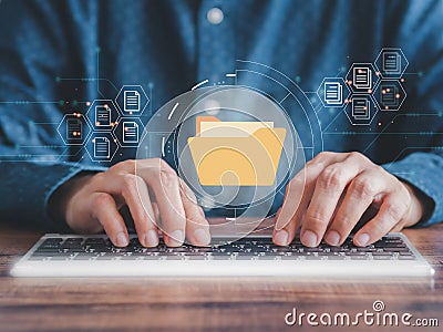 Businessman tpying keyboard show virtual screen icons Document Management System (DMS) working in the office Stock Photo