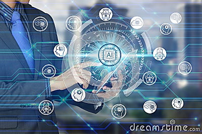 Businessman use tablet with virtual screen Artificial Intelligence technology icon over the Network connection, Artificial Stock Photo
