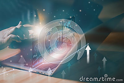 Businessman using computer analyzing market data, stock graph chart background, concept growth development business financial Stock Photo