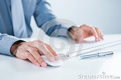 Businessman Using Computer Stock Photo