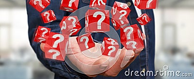 Businessman using cubes with 3D rendering question marks Stock Photo