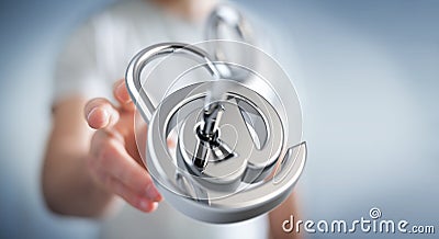 Businessman using 3D rendered digital padlock to secure his internet datas Stock Photo