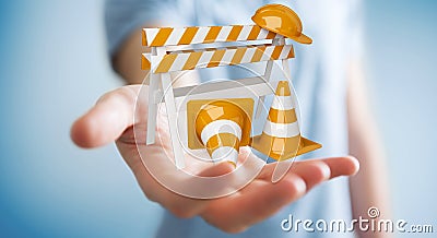 Businessman using digital 3D rendering under construction signs Stock Photo