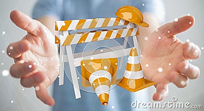 Businessman using digital 3D rendering under construction signs Stock Photo