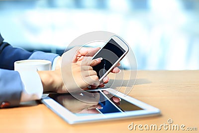 Businessman using digital tablet computer with modern mobile phone Stock Photo