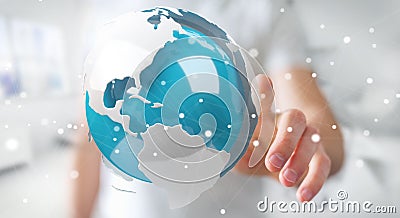 Businessman using flying white and blue 3D rendering earth Stock Photo