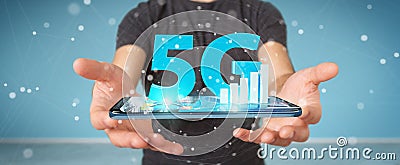 Businessman using 5G network with mobile phone 3D rendering Stock Photo