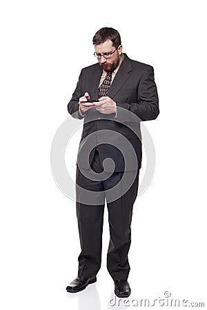 Businessman using a gadget Stock Photo