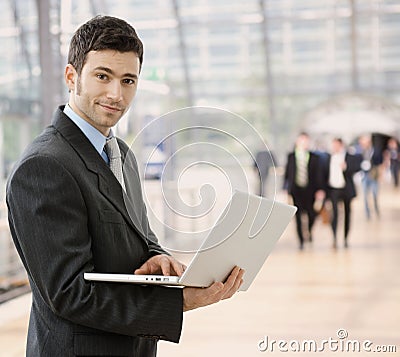 Businessman using laptop Stock Photo