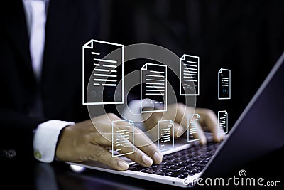 Businessman using laptop data analyzing Management online approve sheet on virtual screen technology. Data analysis and Document Stock Photo