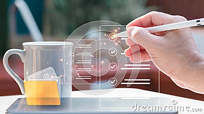 Businessman using a tablet computer to monitor business performance Online survey completion, checklist for a digital form, blurry Stock Photo