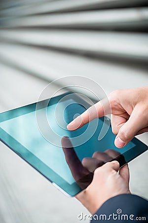 Businessman using a tablet touchscreen Stock Photo