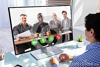 Businessman videoconferencing with his colleagues Stock Photo