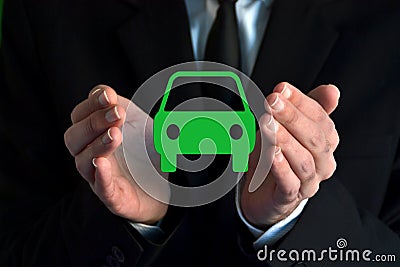 Businessman with a virtual car symbol Stock Photo